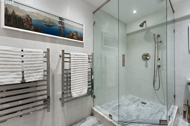 bathroom featuring an enclosed shower