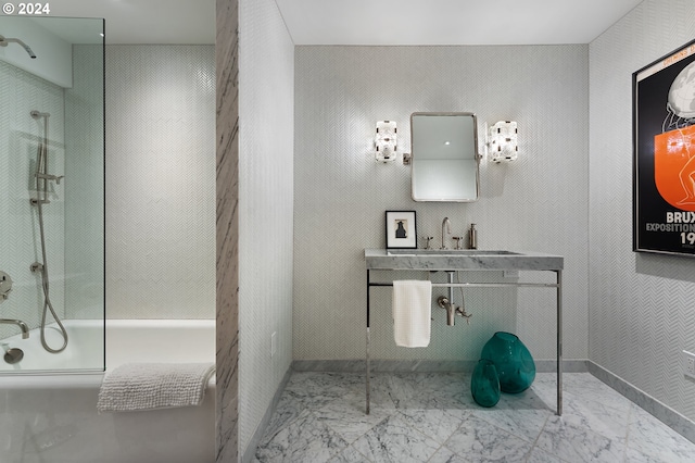 1220 NE 17th Ave Unit 17H, Portland, OR 97232 - full bathroom with marble finish flooring, a sink,  shower combination, and baseboards