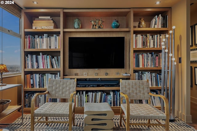 sitting room featuring wood-type flooring