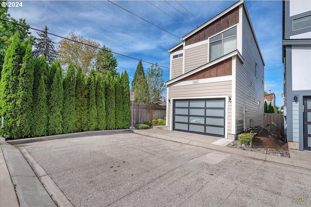 exterior space with a garage