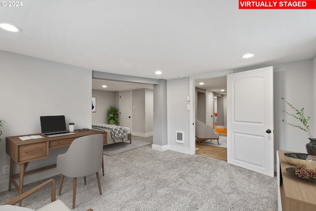 office featuring carpet, recessed lighting, and visible vents