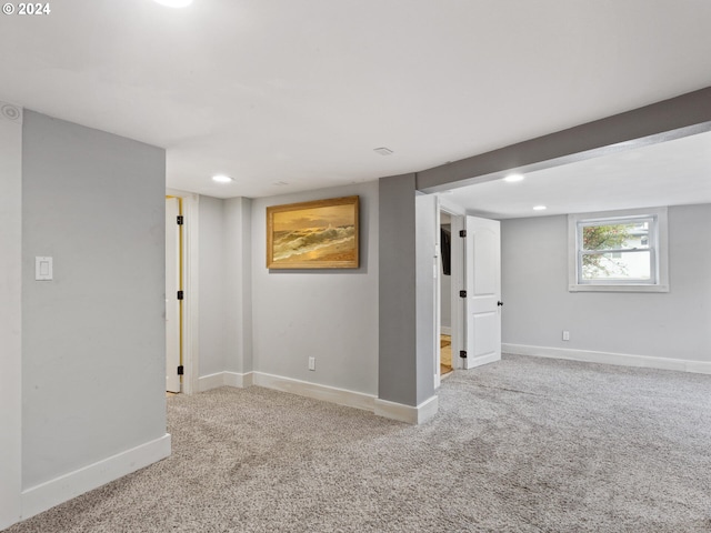 basement featuring carpet flooring, recessed lighting, and baseboards