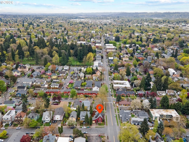 birds eye view of property with a residential view