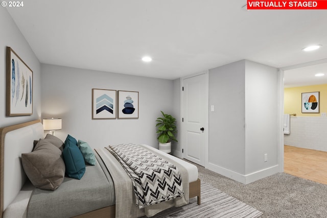 carpeted bedroom with recessed lighting and baseboards