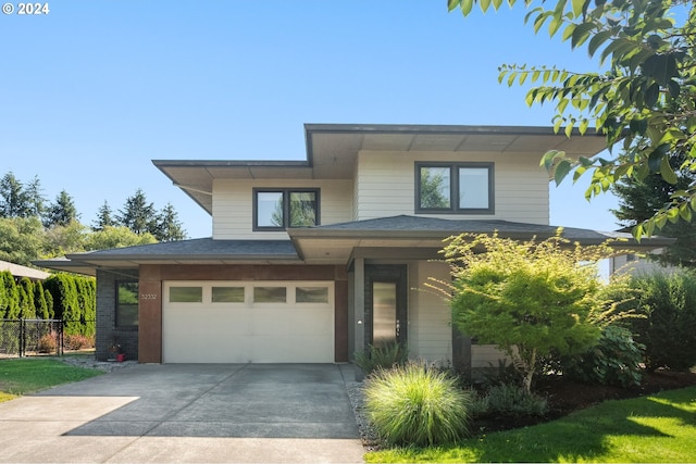 view of front of home with a garage