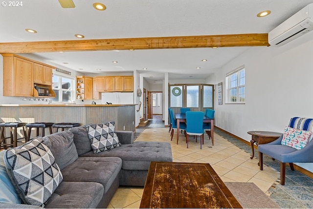living area featuring light tile patterned flooring, a wall mounted AC, beamed ceiling, and recessed lighting