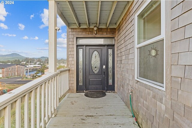 entrance to property with a mountain view