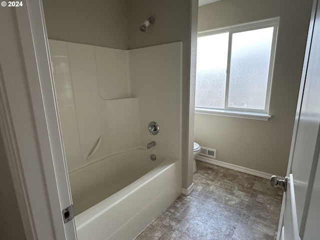 bathroom with  shower combination and toilet