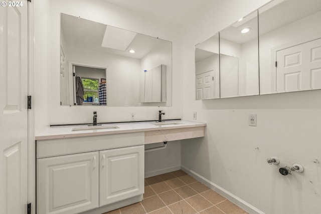 bathroom featuring vanity and tile patterned floors