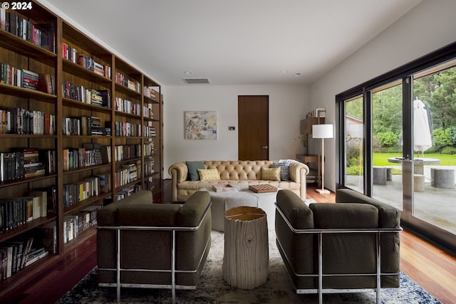 living area with dark hardwood / wood-style floors