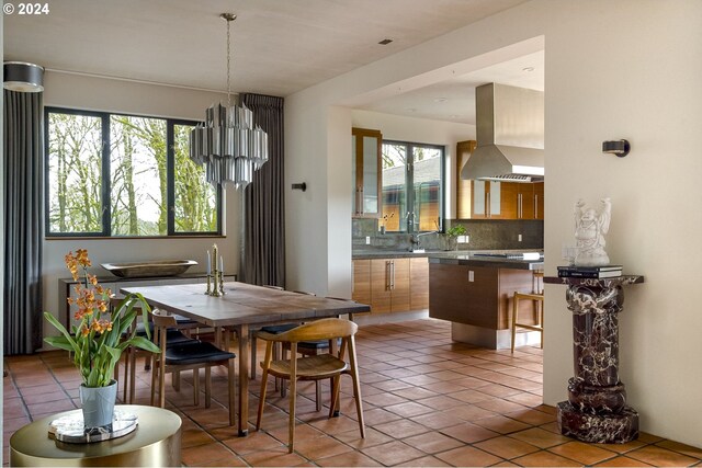 dining area with tile patterned floors and plenty of natural light