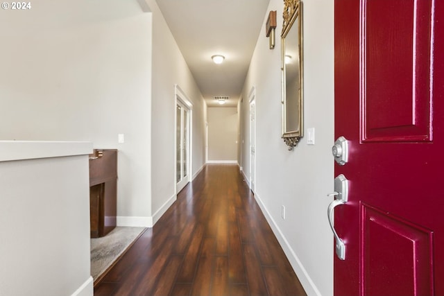 hall featuring dark hardwood / wood-style floors