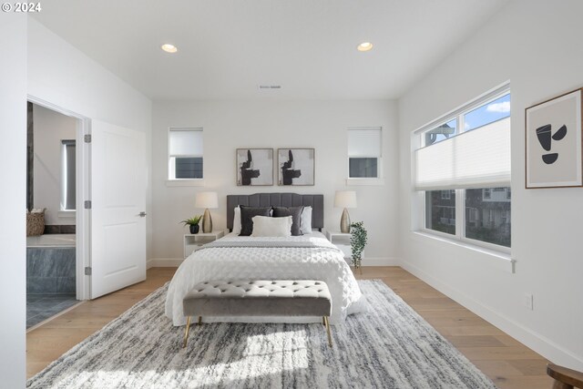 bedroom with light hardwood / wood-style floors