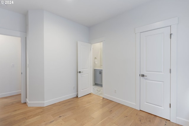 unfurnished bedroom featuring light hardwood / wood-style floors