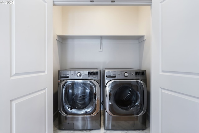 laundry area featuring independent washer and dryer