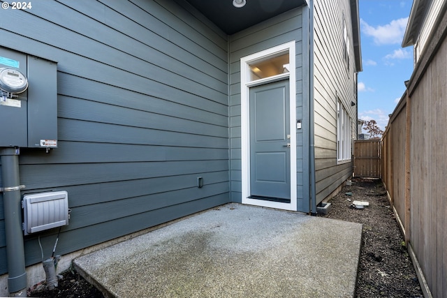 doorway to property with a patio