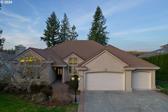 view of front of home with a garage