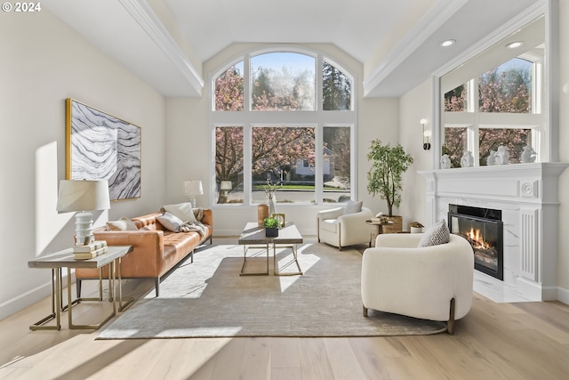 sunroom featuring a premium fireplace