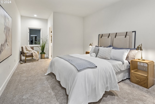 bedroom with light carpet