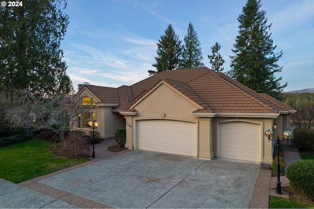 view of front of property with a garage