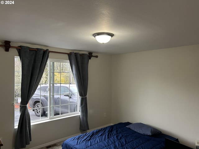 bedroom with a textured ceiling