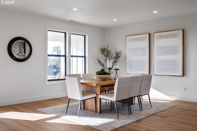 dining room with visible vents, recessed lighting, wood finished floors, and baseboards