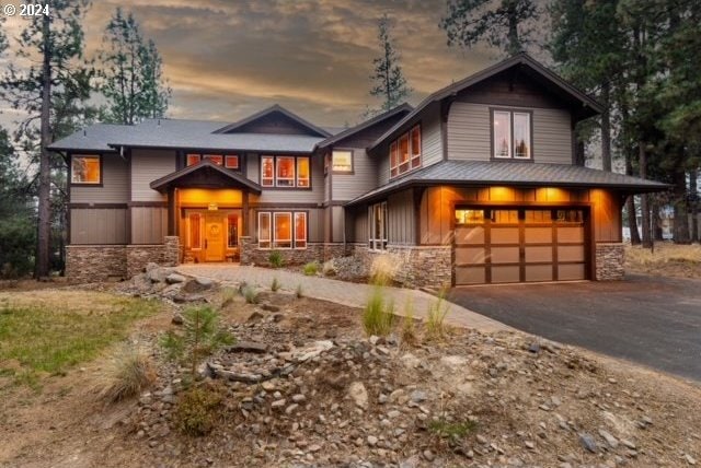 view of front of property with a garage