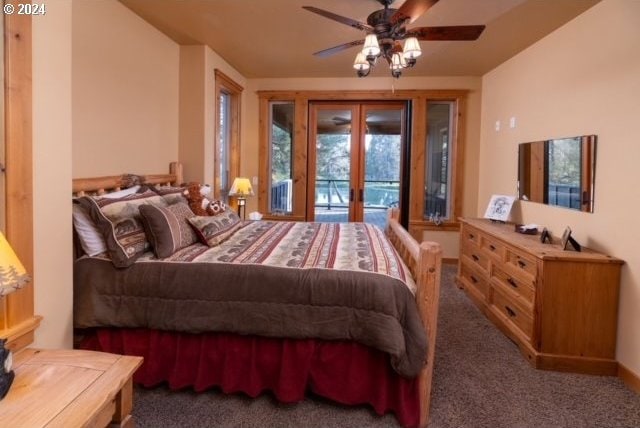 bedroom with dark colored carpet, ceiling fan, and access to outside