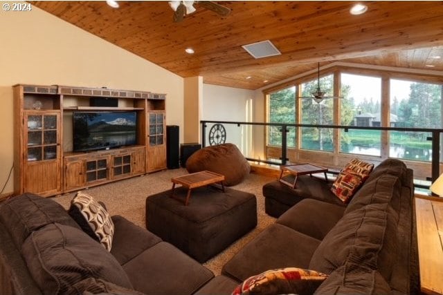 carpeted living room featuring wood ceiling, vaulted ceiling, and ceiling fan