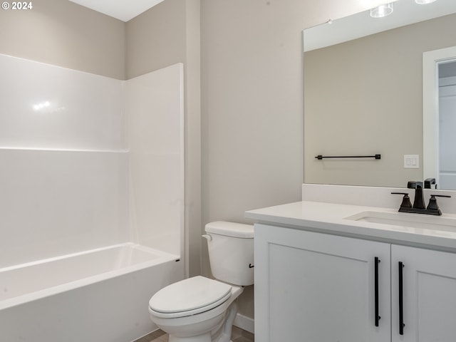 bathroom with shower / bath combination, toilet, and vanity