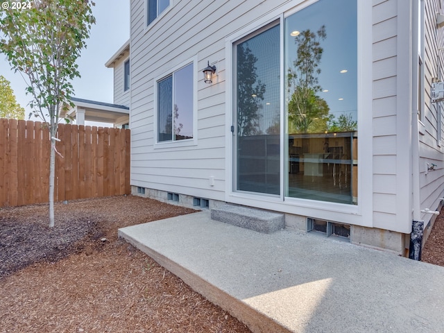 exterior space featuring a patio and fence