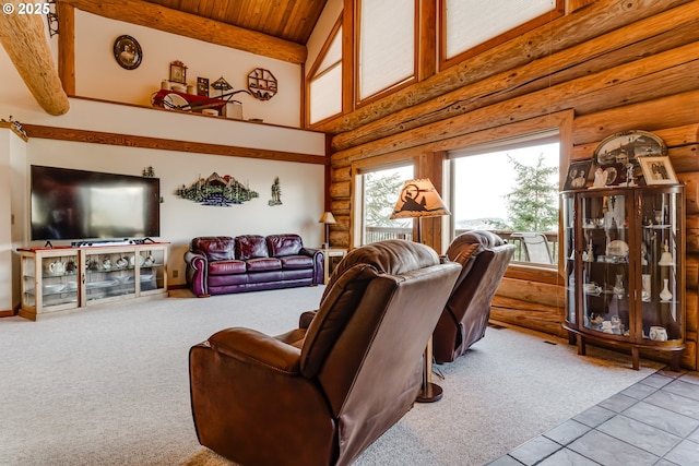 carpeted living room featuring high vaulted ceiling, log walls, and wood ceiling