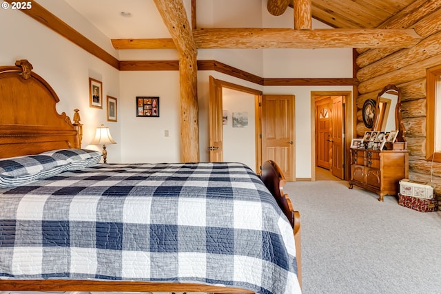 bedroom with lofted ceiling with beams, carpet flooring, and rustic walls