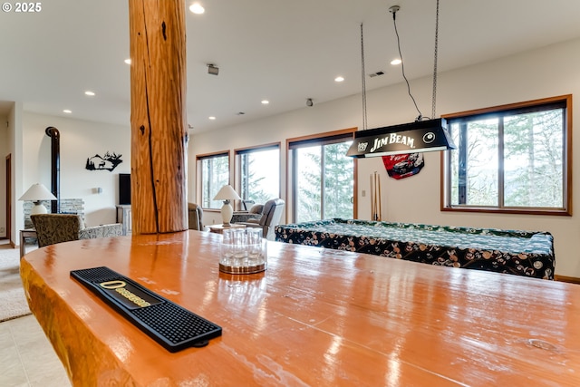 dining area with light tile patterned floors