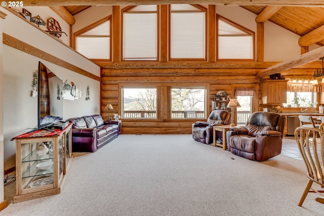 living room with wood ceiling, high vaulted ceiling, light carpet, beamed ceiling, and log walls