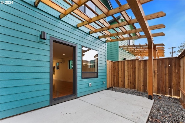 view of patio featuring a pergola