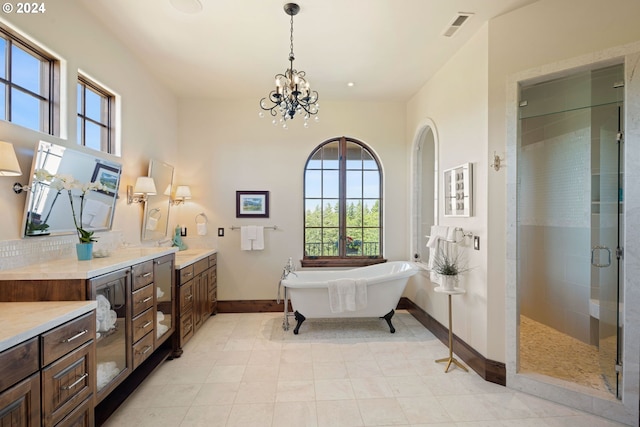 4974 W 44th Ave, Eugene, OR 97405 - bathroom with healthy amount of natural light, baseboards, a shower stall, and a freestanding bath