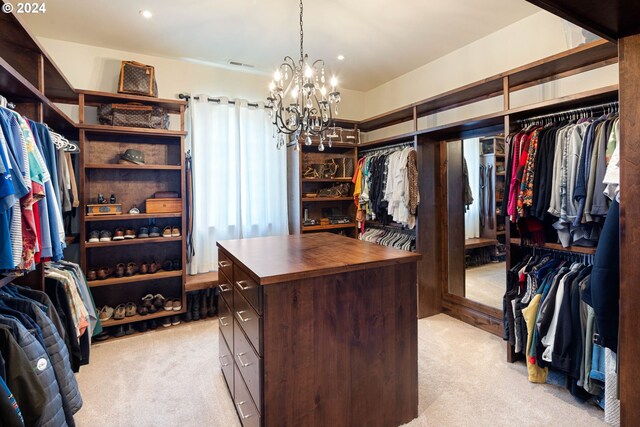 4974 W 44th Ave, Eugene, OR 97405 - spacious closet with light colored carpet and a chandelier