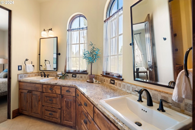 4974 W 44th Ave, Eugene, OR 97405 - full bathroom with ensuite bathroom, double vanity, and tile patterned floors