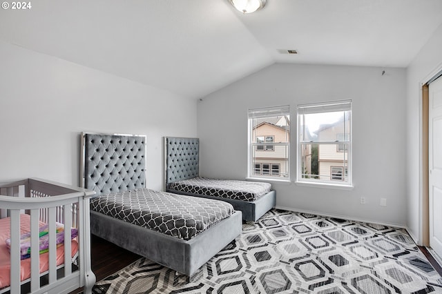 bedroom with vaulted ceiling