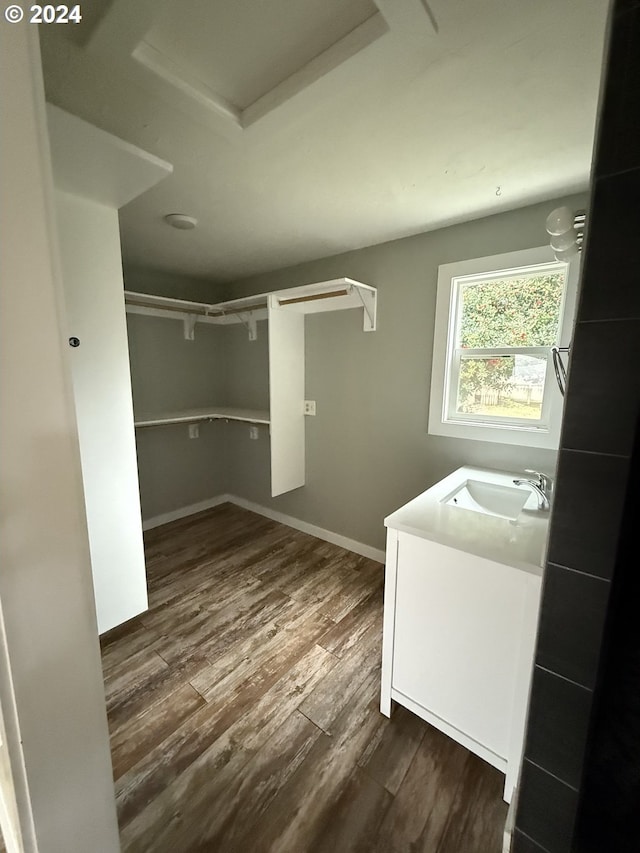 2936 Willakenzie Rd, Eugene, OR 97401 - laundry room with dark wood-style floors and attic access