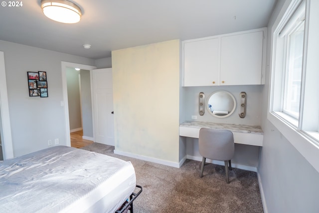 2936 Willakenzie Rd, Eugene, OR 97401 - bedroom featuring built in study area and light carpet