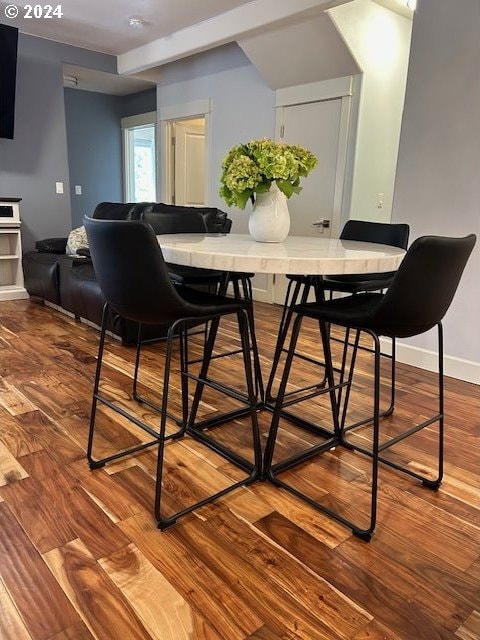 dining room featuring wood-type flooring