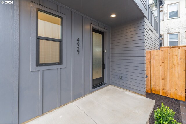 doorway to property with a patio area