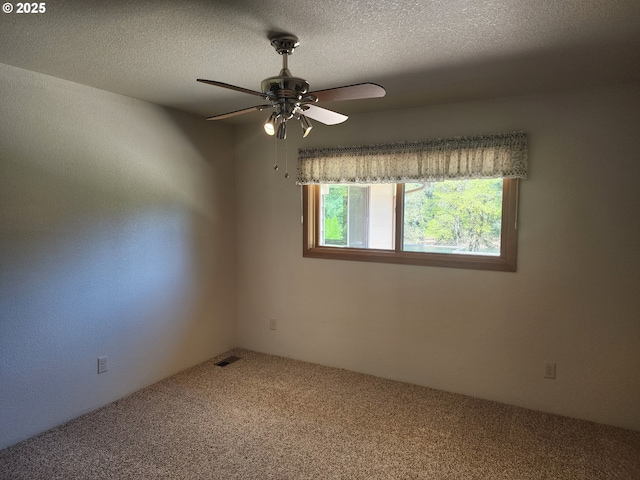 3413 Wild River Dr, Roseburg, OR 97470 - carpeted spare room featuring a ceiling fan and a textured ceiling