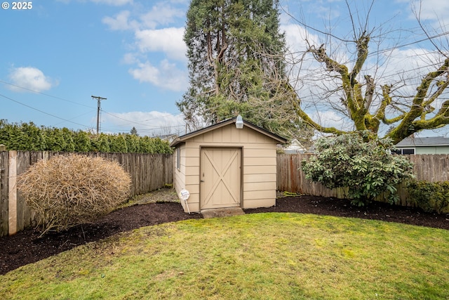 view of outbuilding with a yard