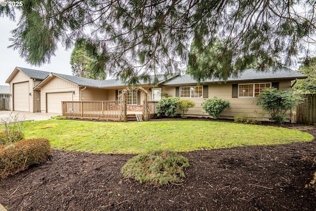 ranch-style home with a garage and a front lawn