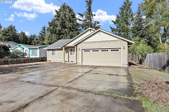 single story home featuring a garage