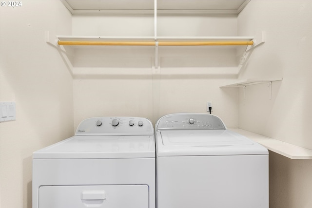 laundry room with washer and dryer