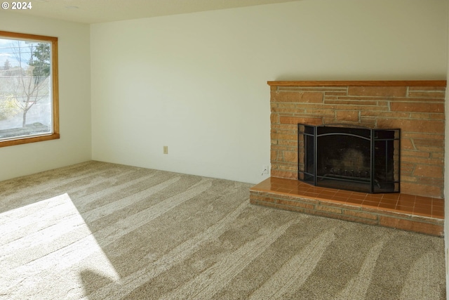 unfurnished living room with carpet flooring